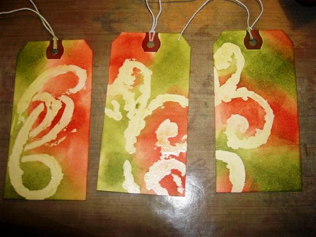 Here are the tags with the mask/frisket dried and Distress inks applied